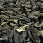 Discarded shoes are displayed at the former German Nazi concentration and extermination camp Auschwitz in Oswiecim January 19, 2015. REUTERS/Pawel Ulatowski